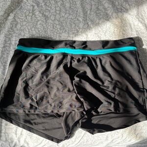 ZeroXposur Black Swim Shorts with Teal Accent